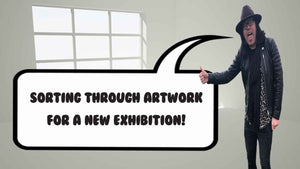 Sorting through artwork for a new exhibition!