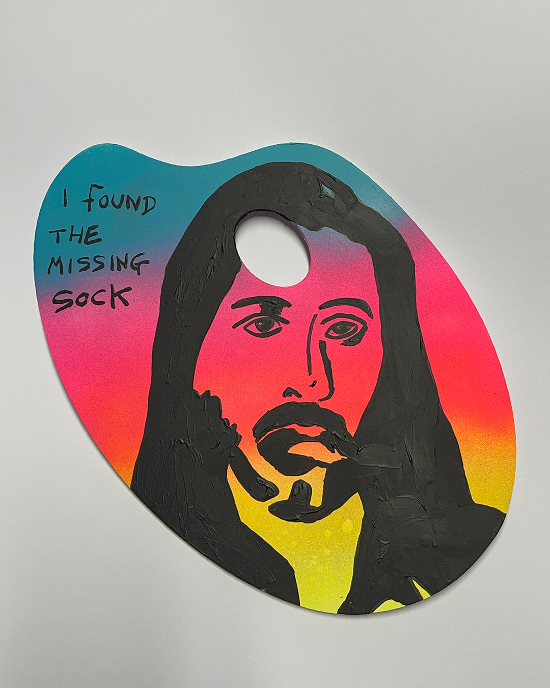 Missing Sock Painting by Barrie J Davies, Acrylic Paint on Artist Pallet, 20 cm x 30 cm, Unframed and ready to hang.