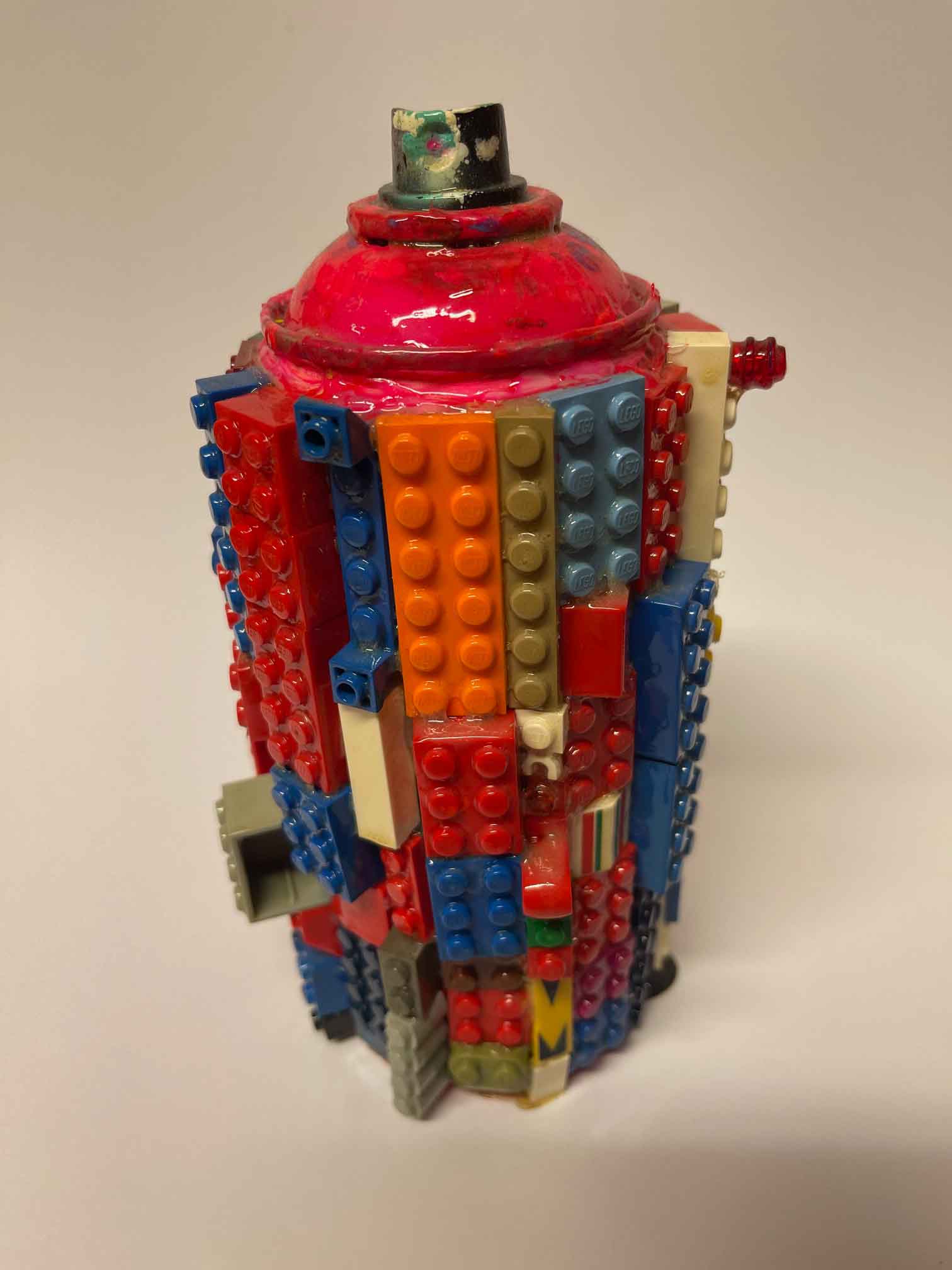 Toy Spray Can Sculpture. This is a unique, hand made one off original. Each piece is a mixed media original directly onto a recycled depressurised spray can. 